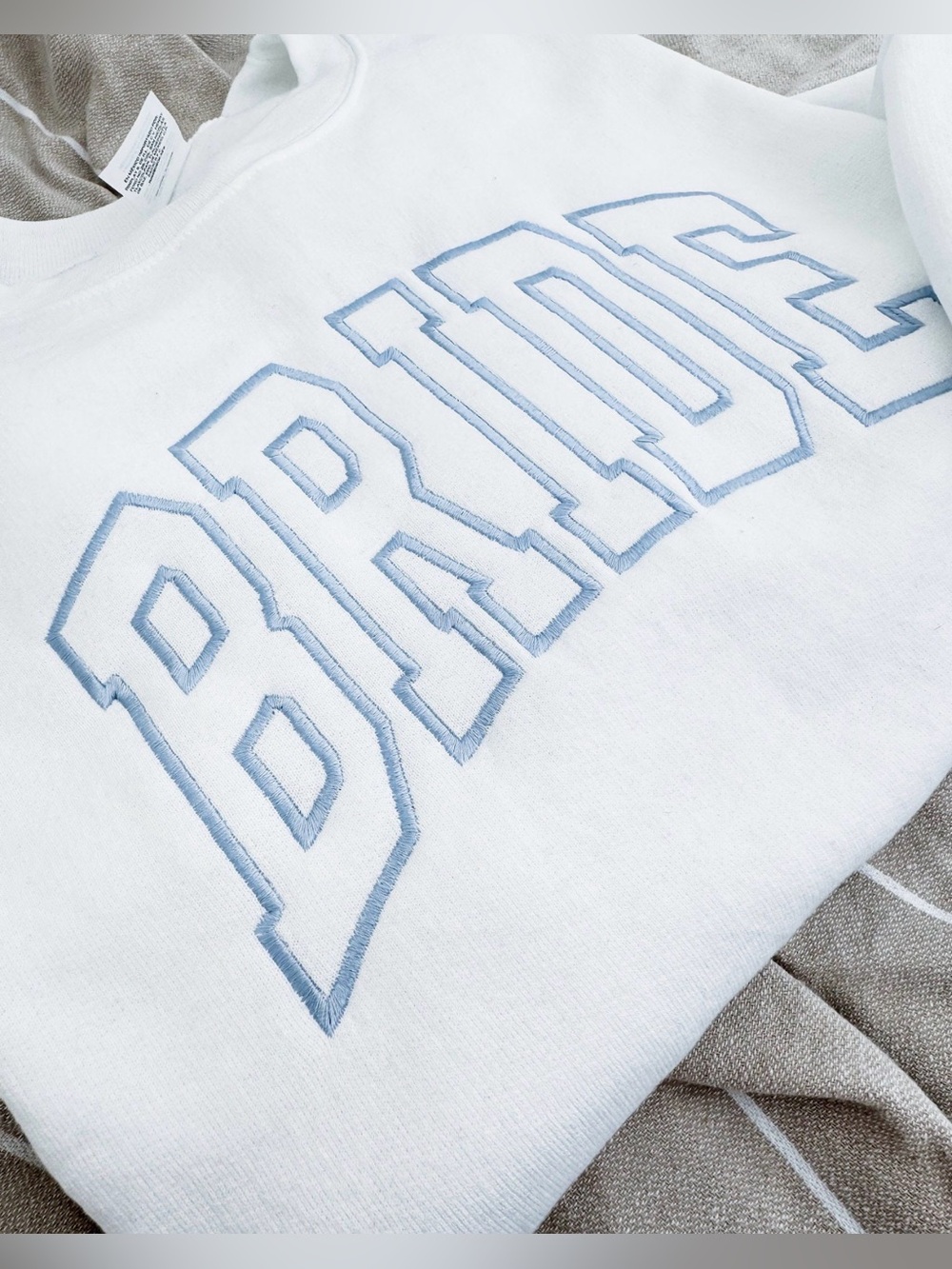 White 'BRIDE' Embroidered Crewneck Sweatshirt - Light Blue Lettering